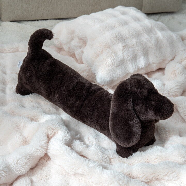Brown dachshund cushion.