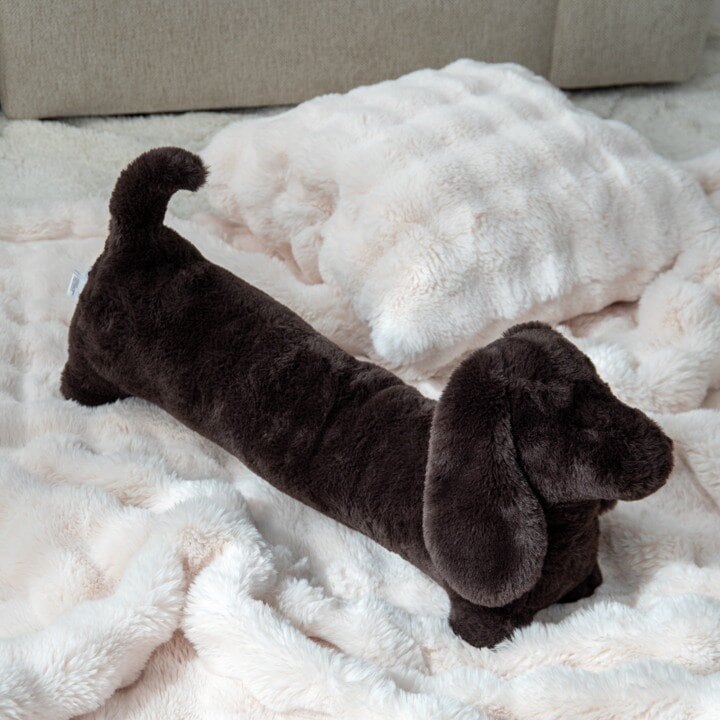 Brown dachshund cushion.