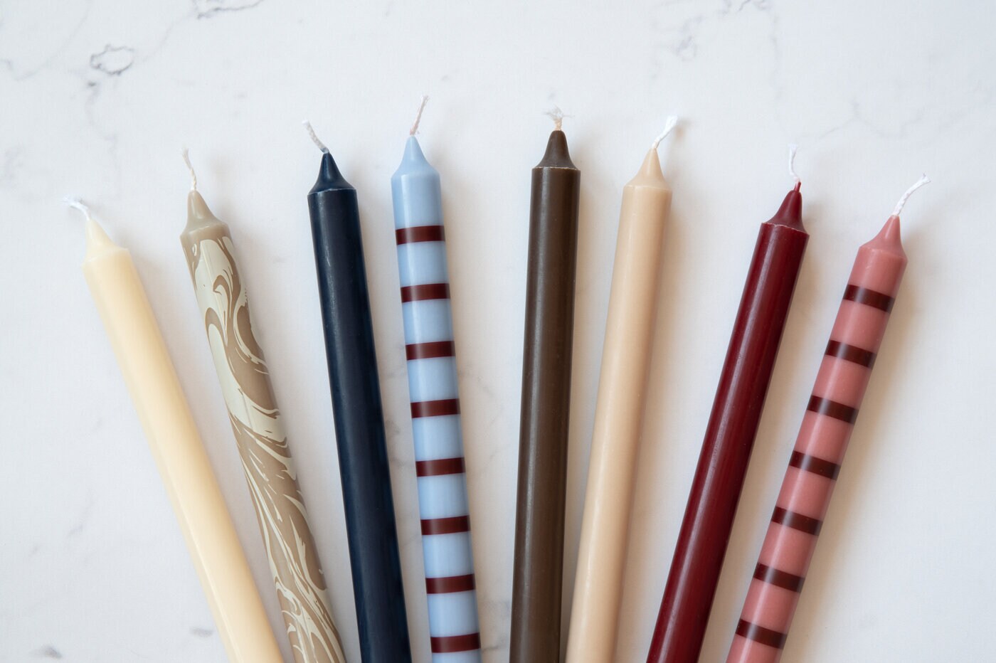 Candles in different patterns and colours