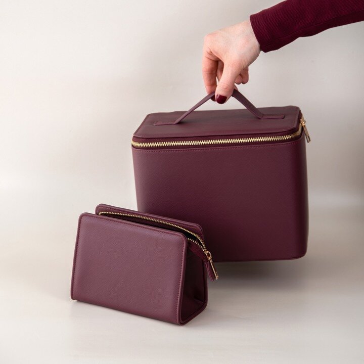 Burgundy coloured toiletry bags