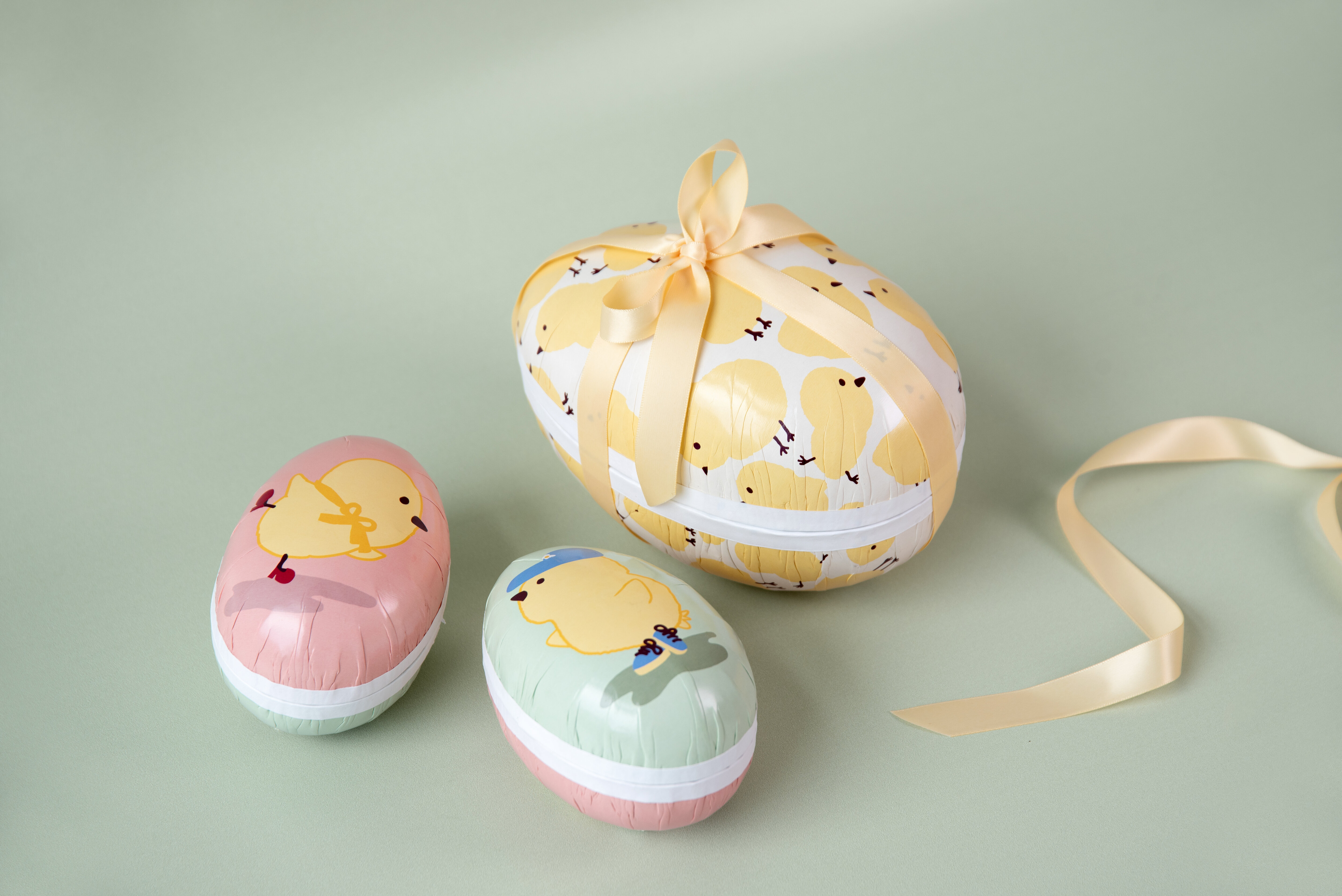 Easter gift wrapping with egg-shaped gift boxes