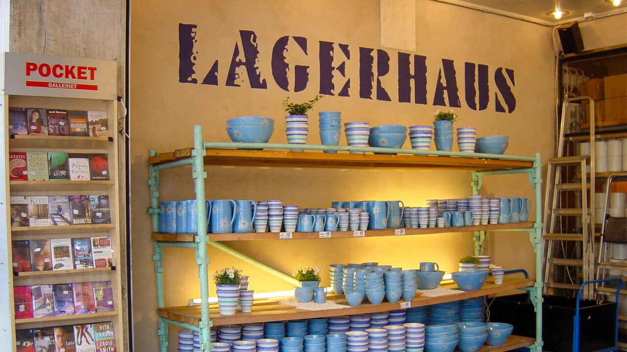 The first Lagerhaus store with turquoise shelving and blue ceramics.