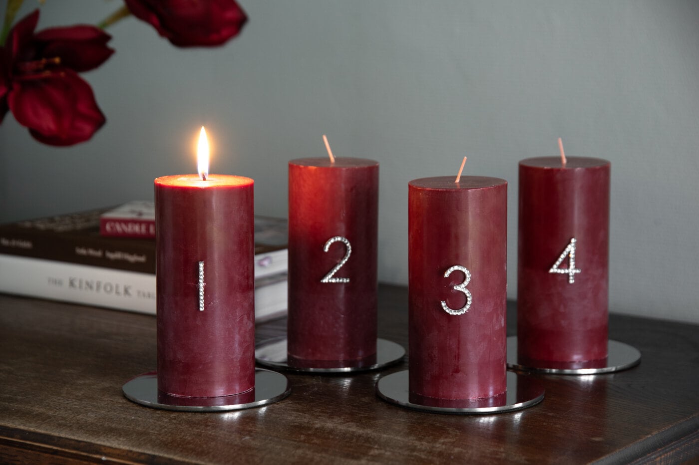 Burgundy coloured pillar candles.