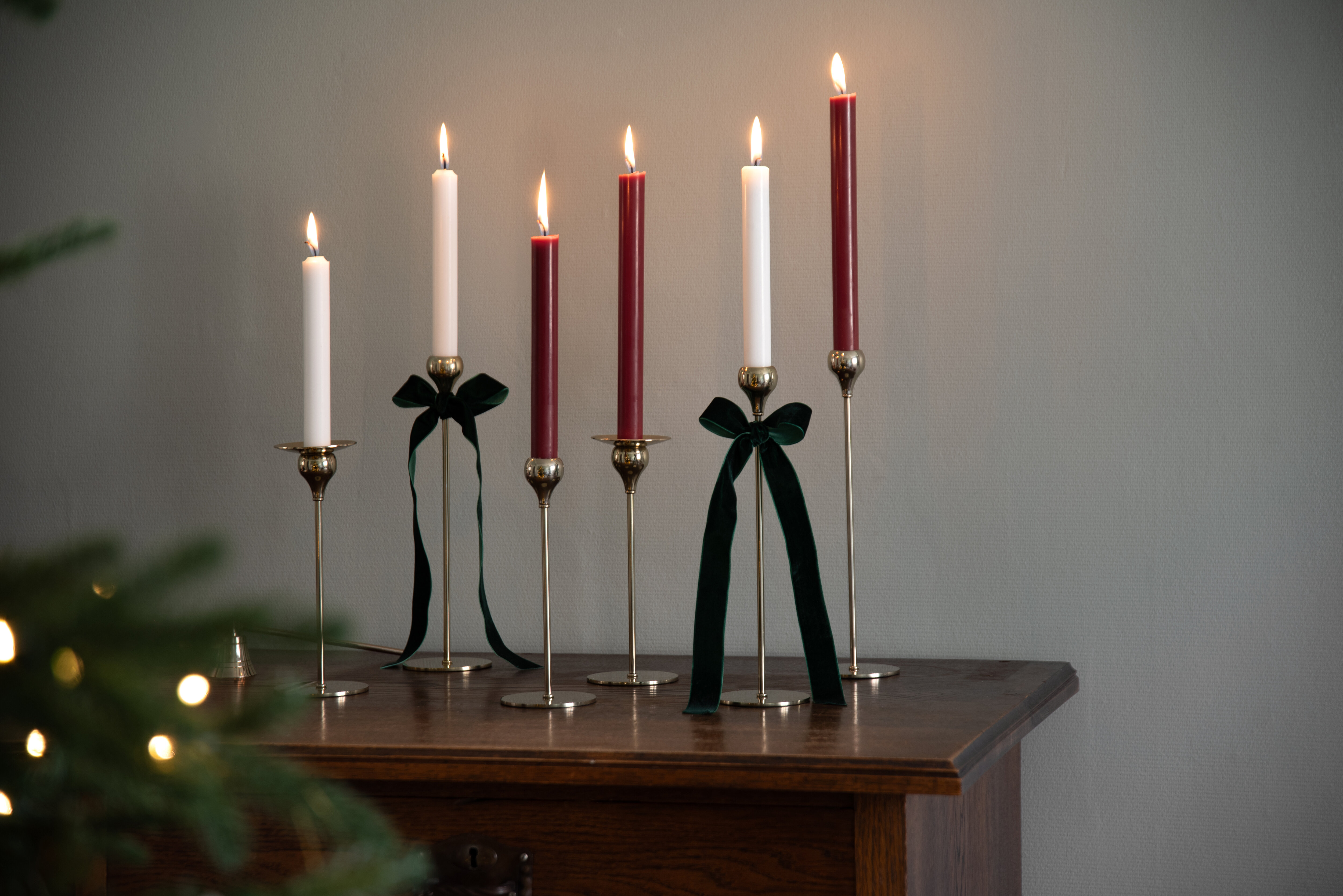Lit candles in candle holders.