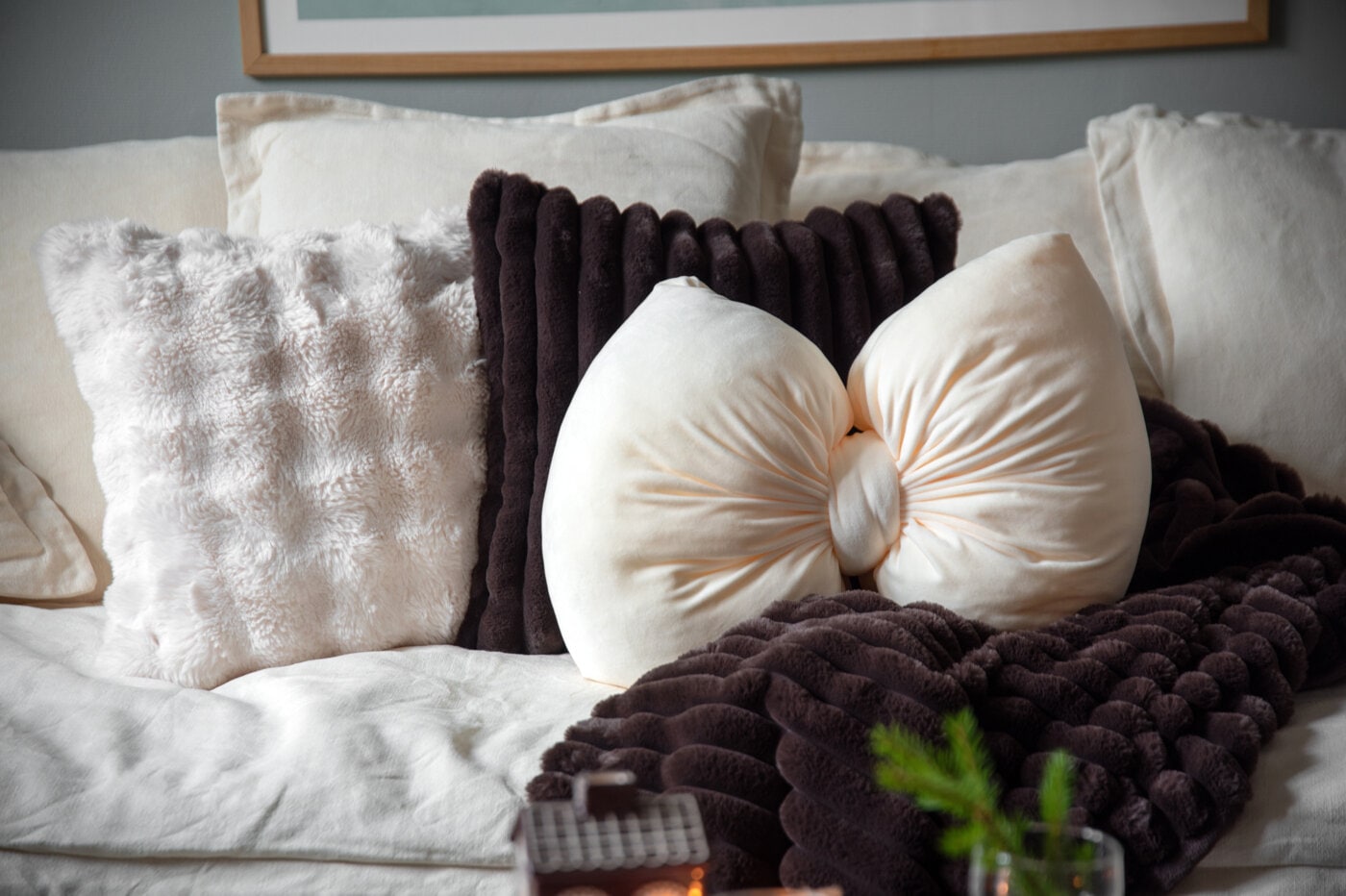 Bow shaped cushion on a sofa.