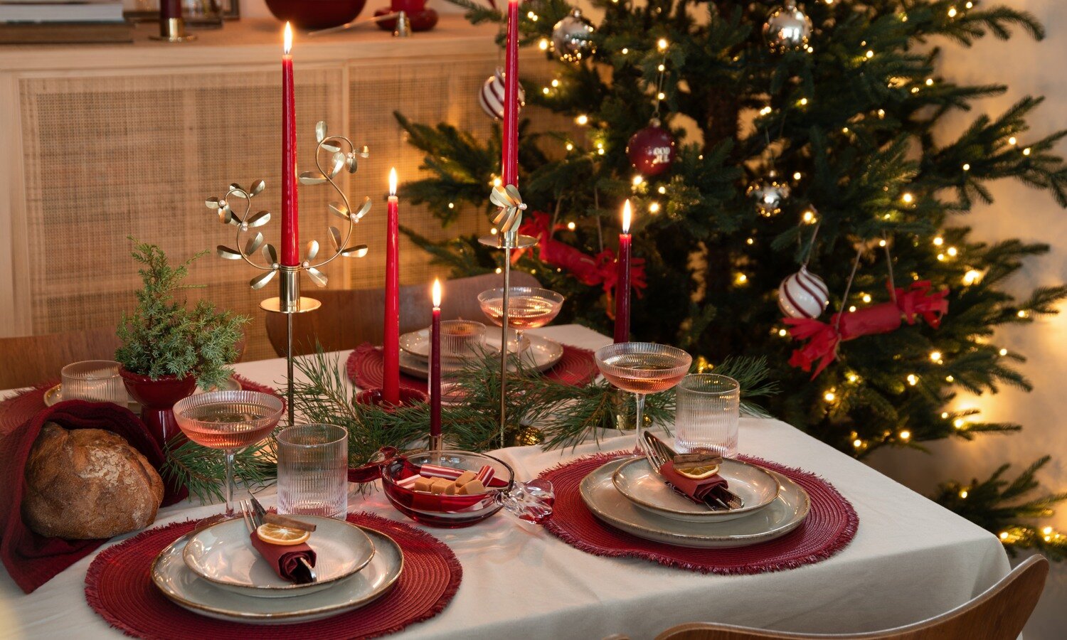 White and red paper stars glowing in a window.