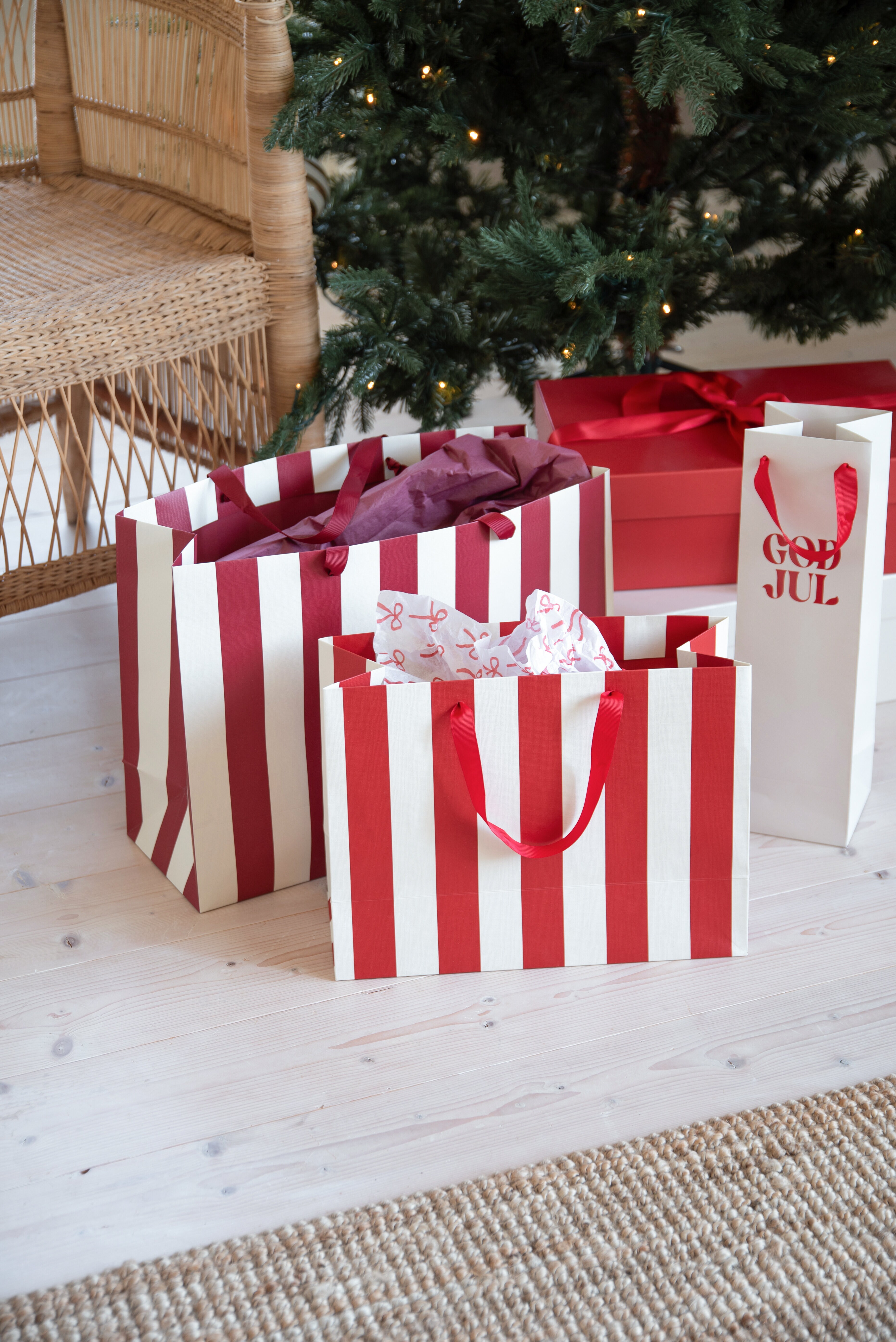 Striped gift bags in red and white.