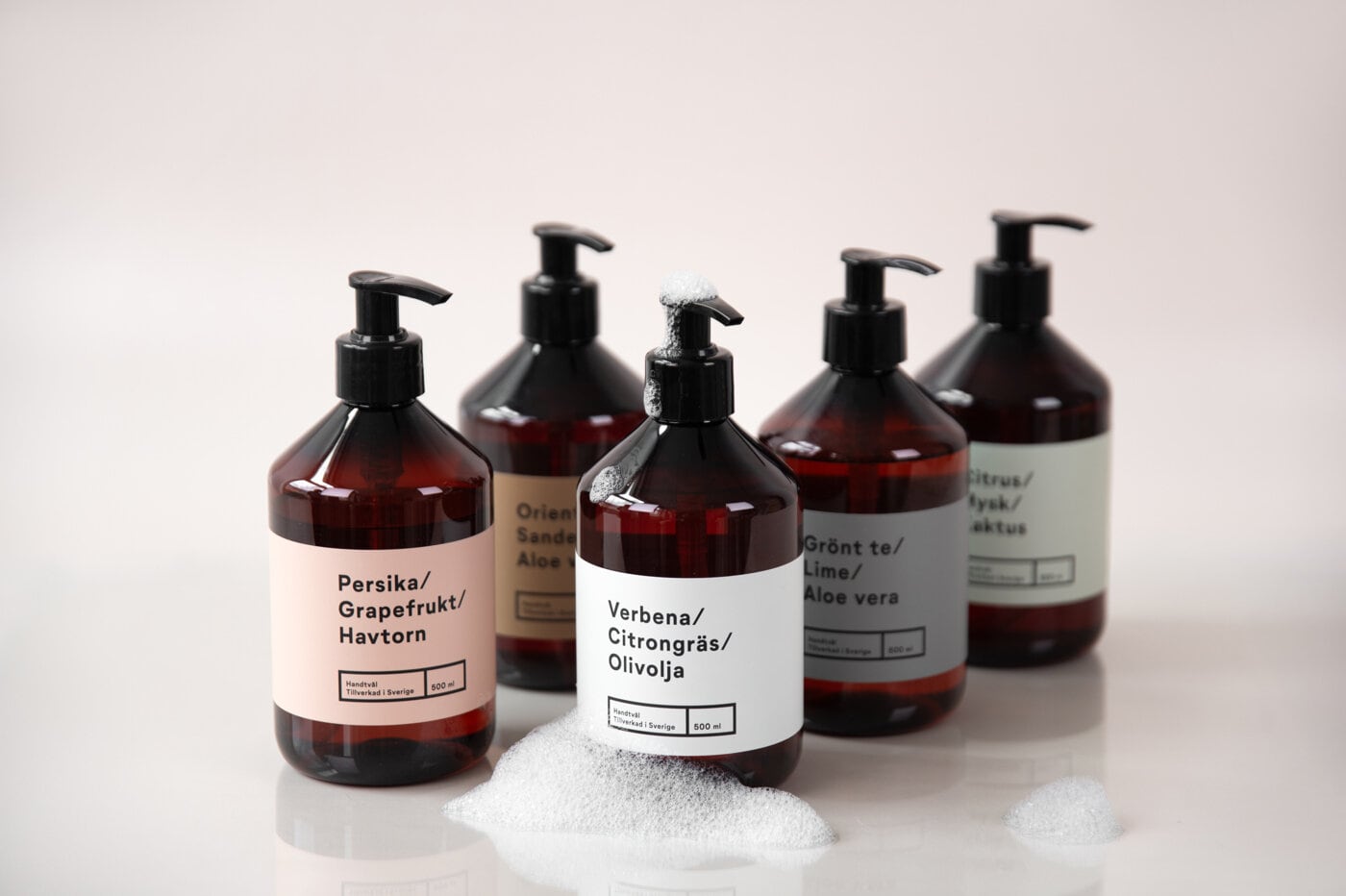 HAND SOAP IN BROWN BOTTLES.