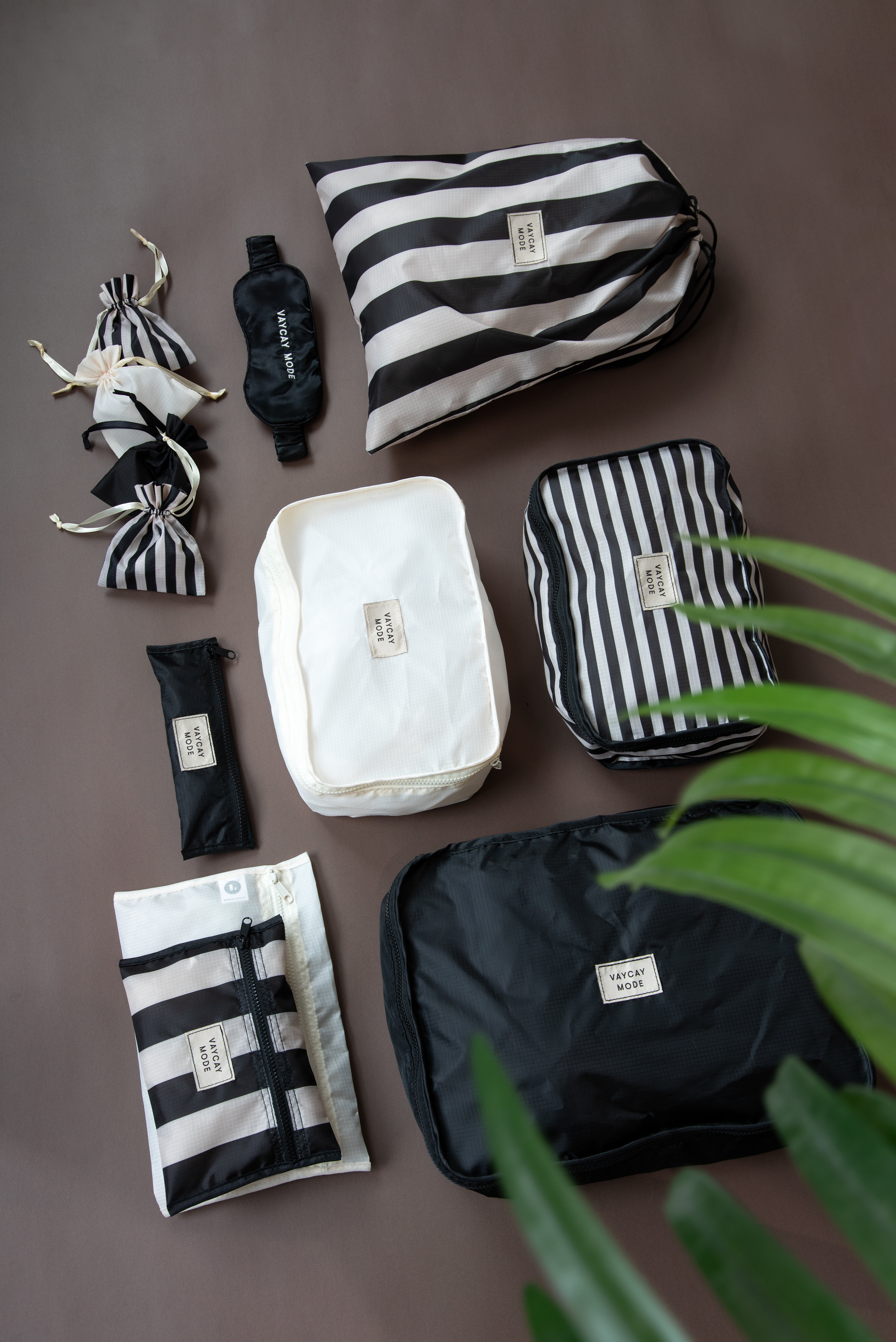 Travel accessories such as packing cubes and storage pouches displayed for inspiration.